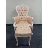 A Victorian style armchair and matching footstool