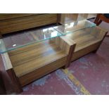 A pair of contemporary bedside chests fitted a drawer with glass shelf