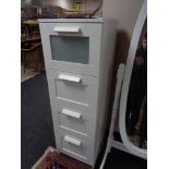 An Ikea four drawer white chest