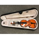 A modern 3/4 size violin in case with bow