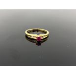 A 10ct gold ruby and diamond ring,