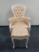 A Victorian style armchair and footstool