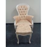 A Victorian style armchair and footstool