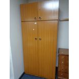 A teak effect wardrobe,