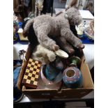 A box of old soft toys, donkey, cribbage board,