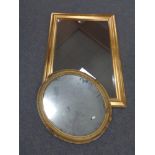 A late 19th century oval gilt composite framed mirror and a contemporary mirror
