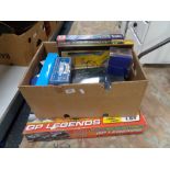 A Scalectrix GP Legends set and a box of cassette player,