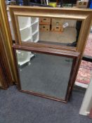 A pair of wooden bevelled mirrors and a gilt framed mirror