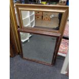 A pair of wooden bevelled mirrors and a gilt framed mirror