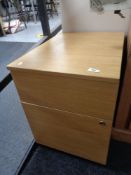 A beech two drawer filing chest