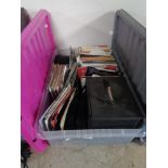 A large quantity of 45 RPM records including Rod Stewart,