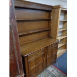 A reproduction oak kitchen dresser