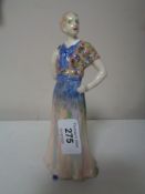 A Royal Doulton figure - Lady in flowing dress CONDITION REPORT: Good condition.