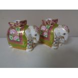 A pair of Royal Crown Derby Mother Indian Elephant paperweights with stoppers