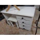 A painted white knee hole dressing table and stool