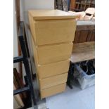 A beech five drawer narrow chest
