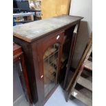 A Victorian glazed double door bookcase