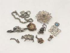 A silver filigree brooch and a small quantity of silver/white metal jewellery