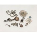 A silver filigree brooch and a small quantity of silver/white metal jewellery