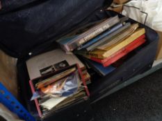 A suitcase of LP records and 45 RPM singles