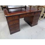 A reproduction mahogany pedestal desk CONDITION REPORT: 137cm by 76cm by 76cm.