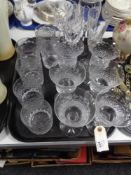 A tray of cut crystal and glass ware