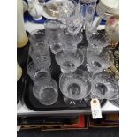 A tray of cut crystal and glass ware