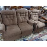 A brown cloth two seater settee and matching armchair