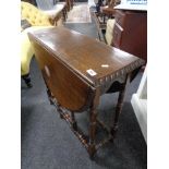 An Edwardian gate leg table