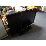 A Samsung 32 inc lcd tv with remote