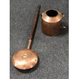 An antique copper urn with tap and a bed warming pan