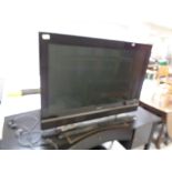 A Kishi 42" LCD TV with remote