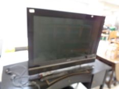 A Kishi 42" LCD TV with remote