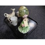 A tray of Leonardo Collection china lady figure, ornamental style decorative egg on carved stand,