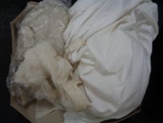 A vintage wedding dress and veil in box