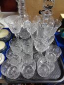 A tray of crystal and decanters