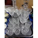 A tray of crystal and decanters