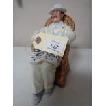 A Royal Doulton figure - Taking things easy HN 2680