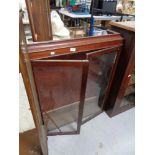 An Edwardian bookcase top