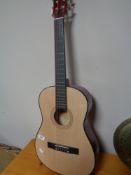 A CB Sky acoustic guitar