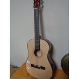 A CB Sky acoustic guitar