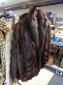 Three fur coats