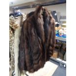 Three fur coats