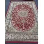 A fringed tabriz rug CONDITION REPORT: 210cm by 144cm.
