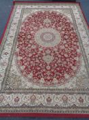 A fringed tabriz rug CONDITION REPORT: 210cm by 144cm.