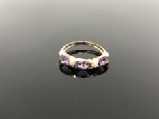 A 10ct gold diamond and amethyst ring,