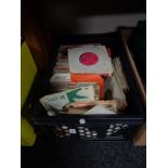 A box 45 RPM records including The Searchers,