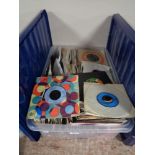 A large quantity of 45 RPM records including David Bowie, Boney M,