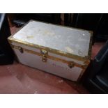 A metal bound shipping trunk