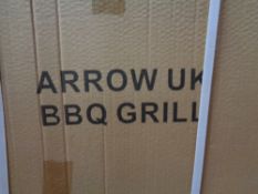 A boxed Arrow BBQ grill